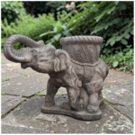 Elefante decorativo con vaso